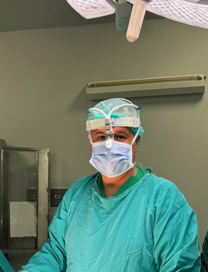 Prof. Dr. Suat Gezer in operating room attire